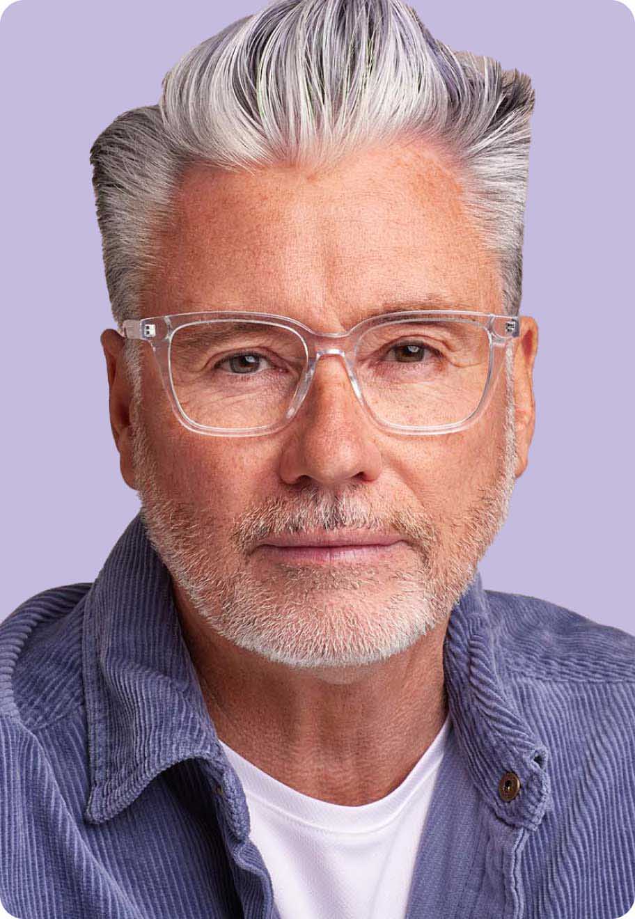 A photo of a model wearing the Oscar Wylee Jinky frame in Clear Crystal.