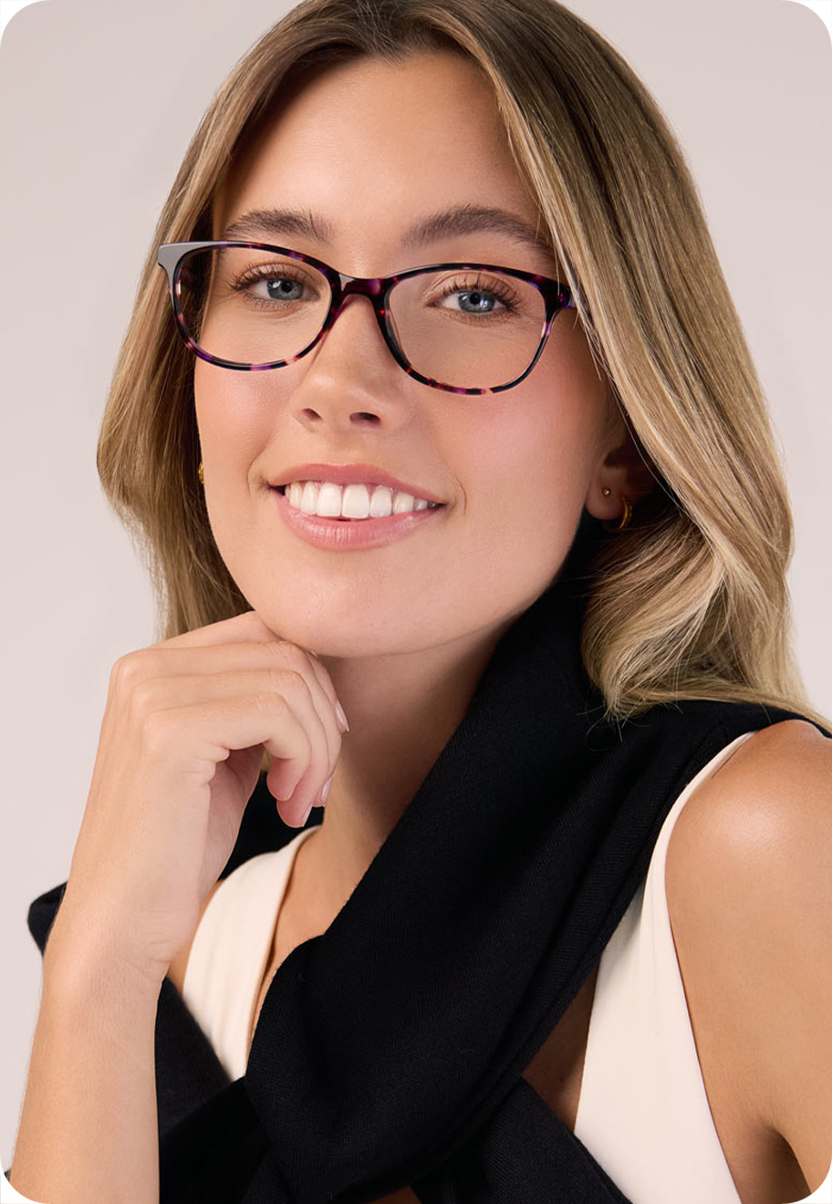 A model wearing Evie optical glasses.