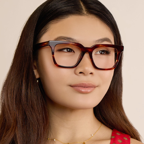 Model wearing Serge optical frame in Smokey Marmalade.