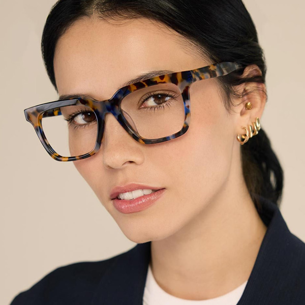 Model wearing Serge optical frame in Speckled Bluebird.