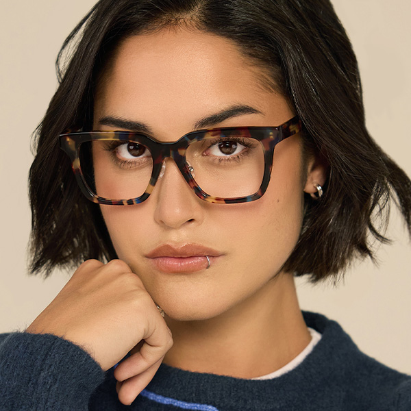 Model wearing Serge 2 optical frame in Sapphire Tortoise