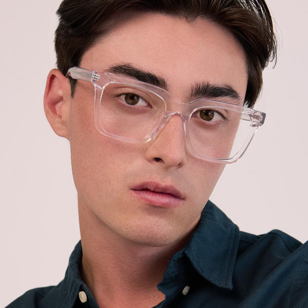 Model wearing Serge Large optical frame in Clear Crystal