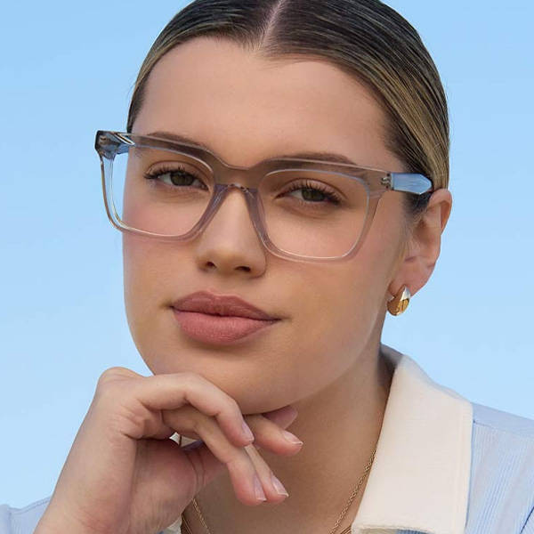 Model wearing Serge Large optical frame in Smoke