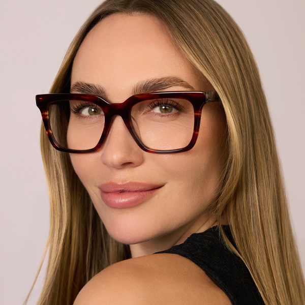 Model wearing Serge Large optical frame in Smokey Marmalade