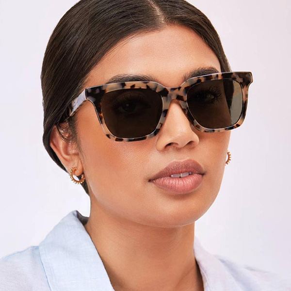 Model wearing Serge sunglasses frame in Chocolate Chip.