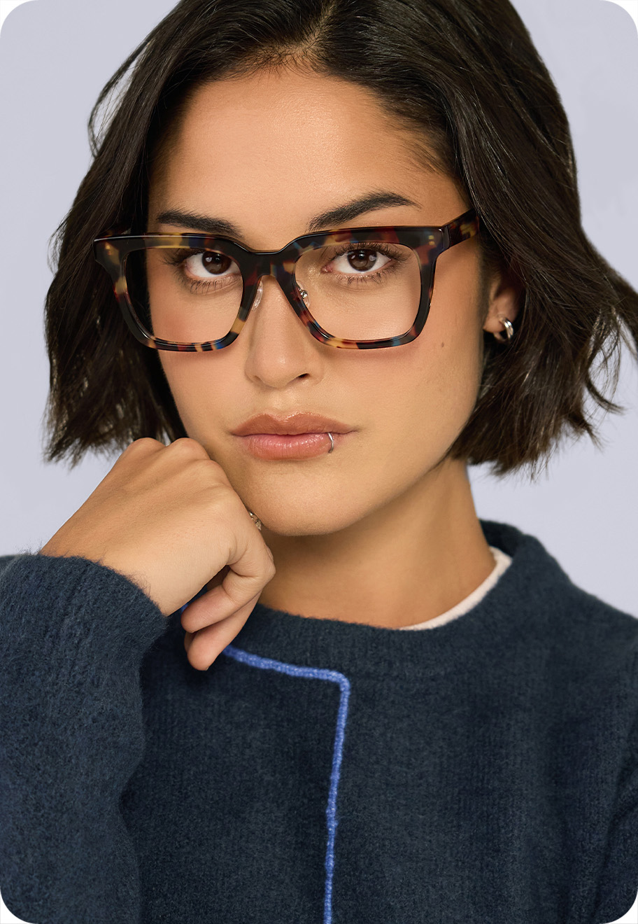 A photo of two model wearing Oscar Wylee Serge 2 frames.