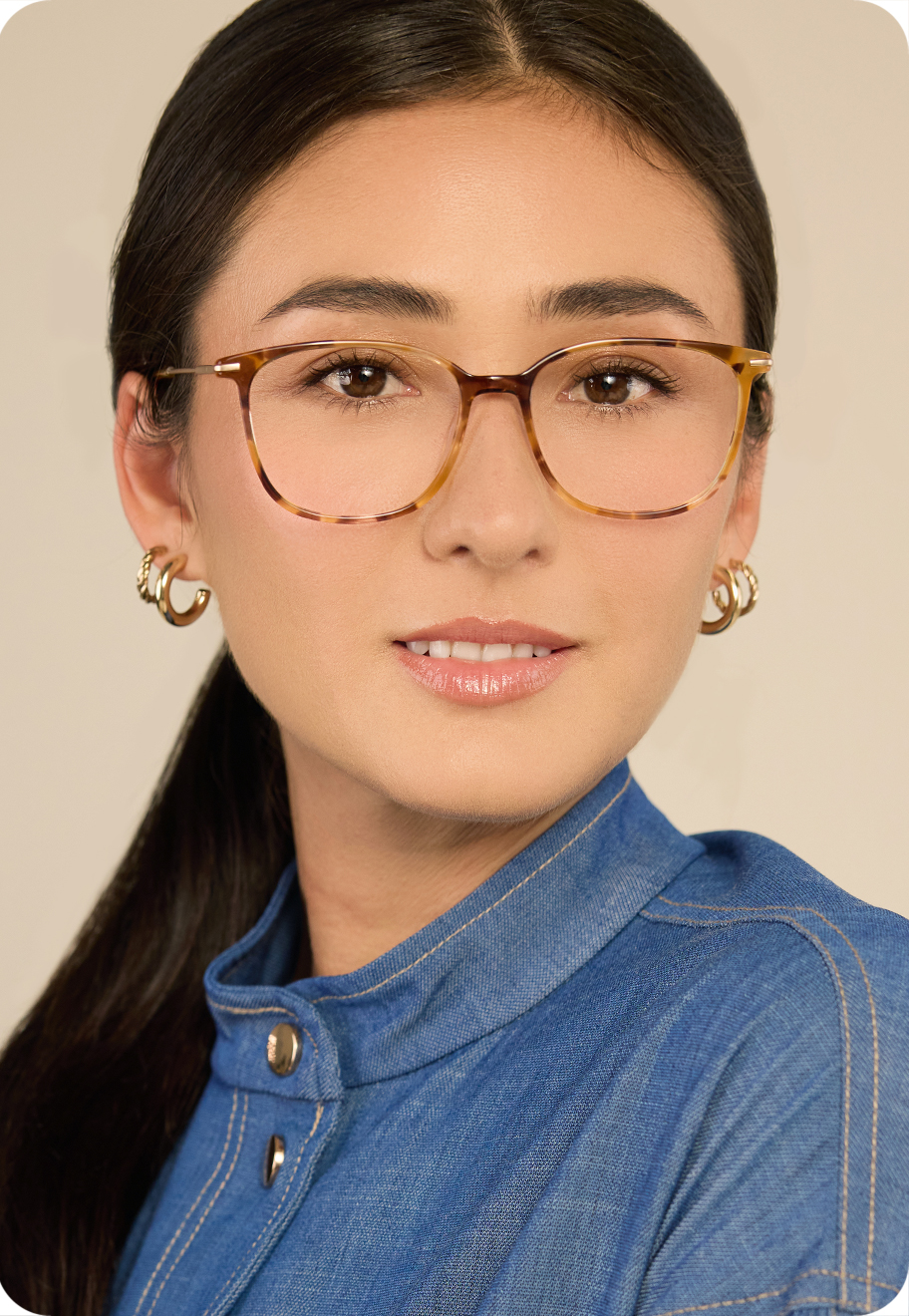 A photo of a model wearing OW Mumford optical glasses in Autmun Petal.