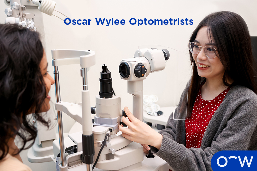 An Oscar Wylee optometrist performing an eye test on a
patient.