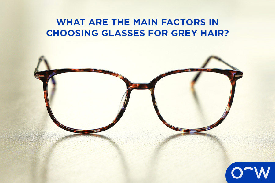 A pair of tortoiseshell Oscar Wylee frames for grey hair.