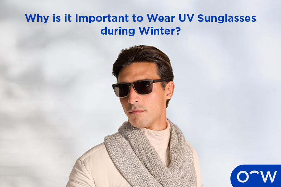 A person wearing winter clothes and sunglasses.