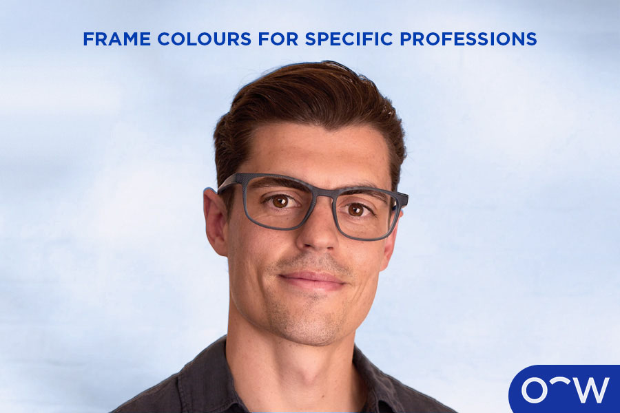 An image of a man wearing rectangular, black glasses.