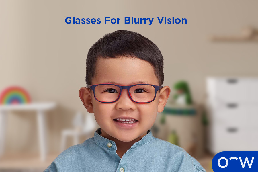 A young boy wearing prescription glasses