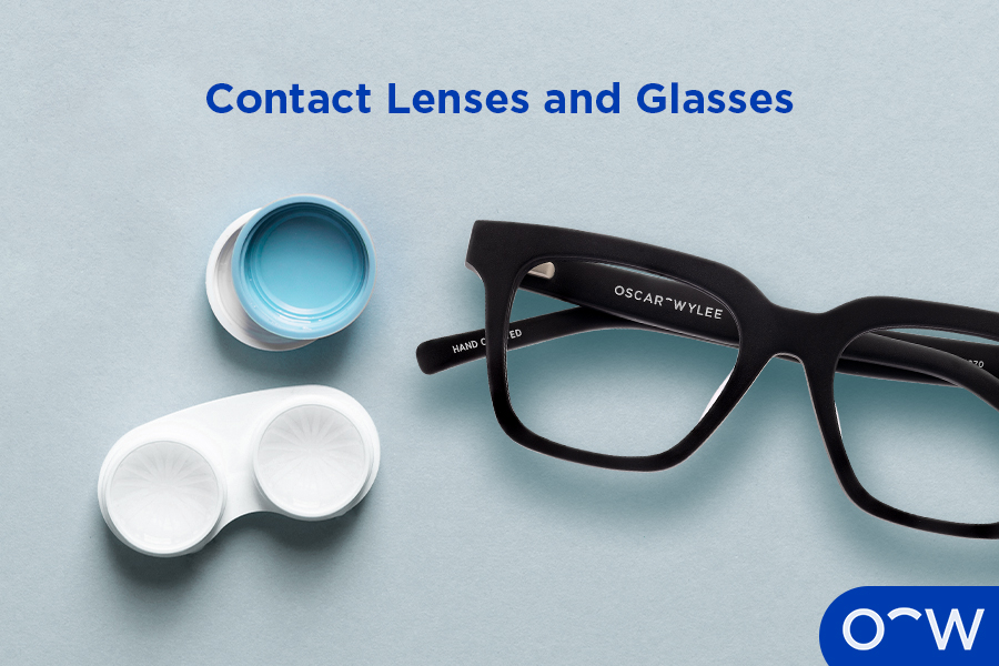 An empty contact lens case next to a pair of Oscar Wylee glasses.