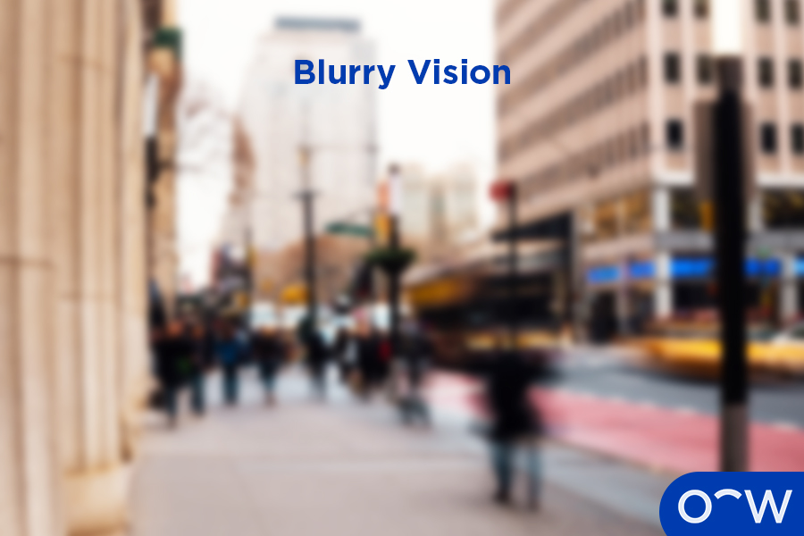 A person with blurry vision caused by a corneal abrasion.