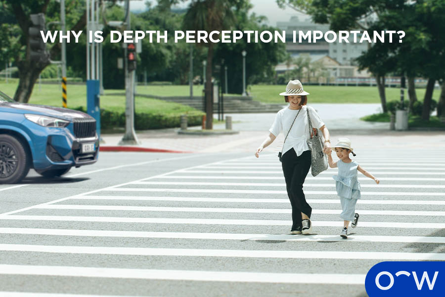 An image of a mother and child crossing the road.
