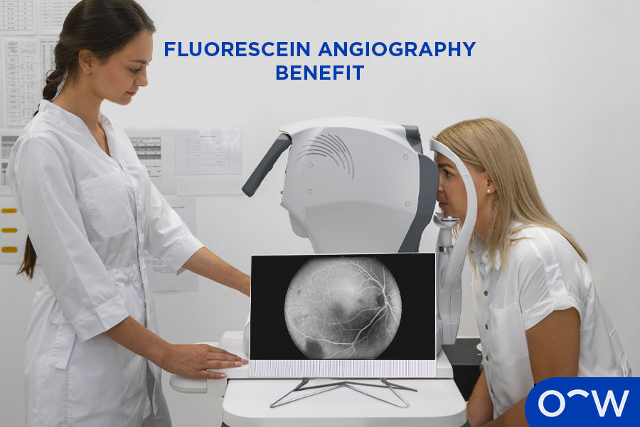 Ophthalmologist performing a fluorescein angiography on a patient as indicated with a screen showing the retina and using an instrument.