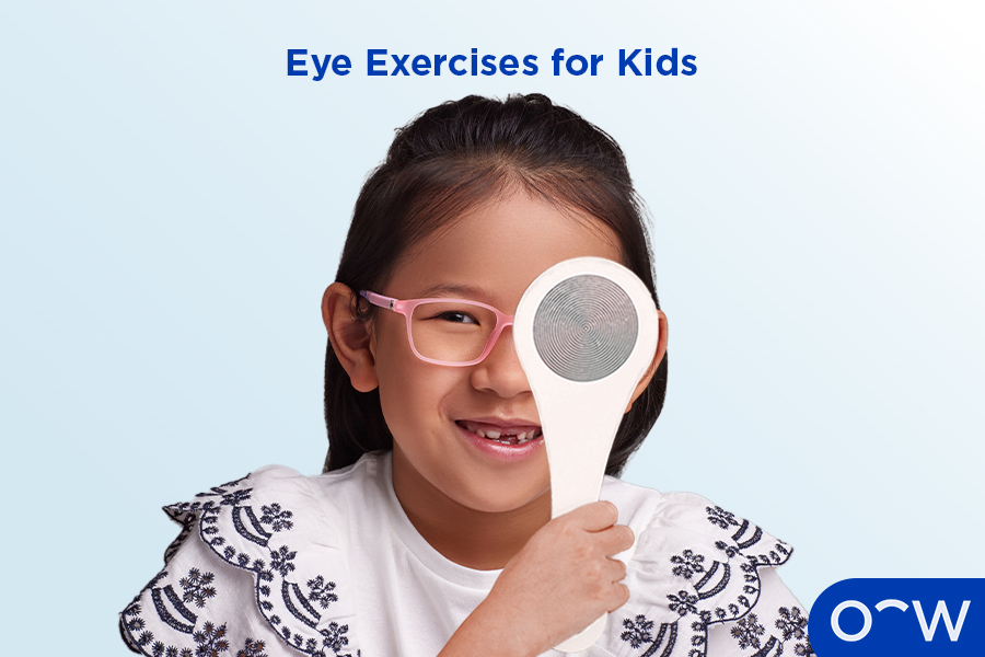 A girl taking an eye test with one eye covered.