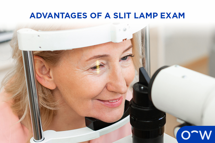 A women receiving a slit lamp exam in an eye test.