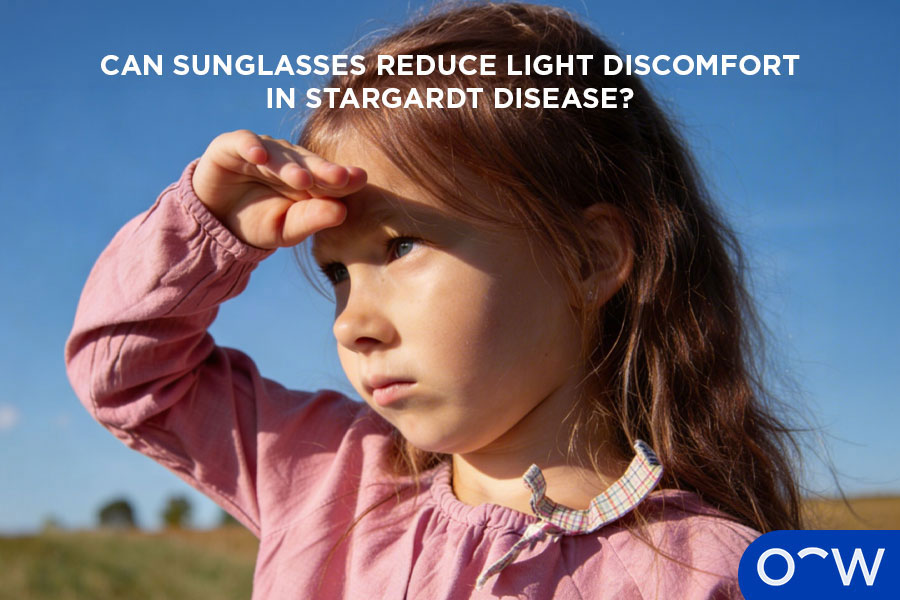 A photo of a child blocking her eyes from the sun.