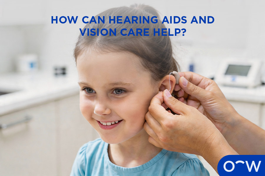 A photo of a child getting a hearing aid fitted.