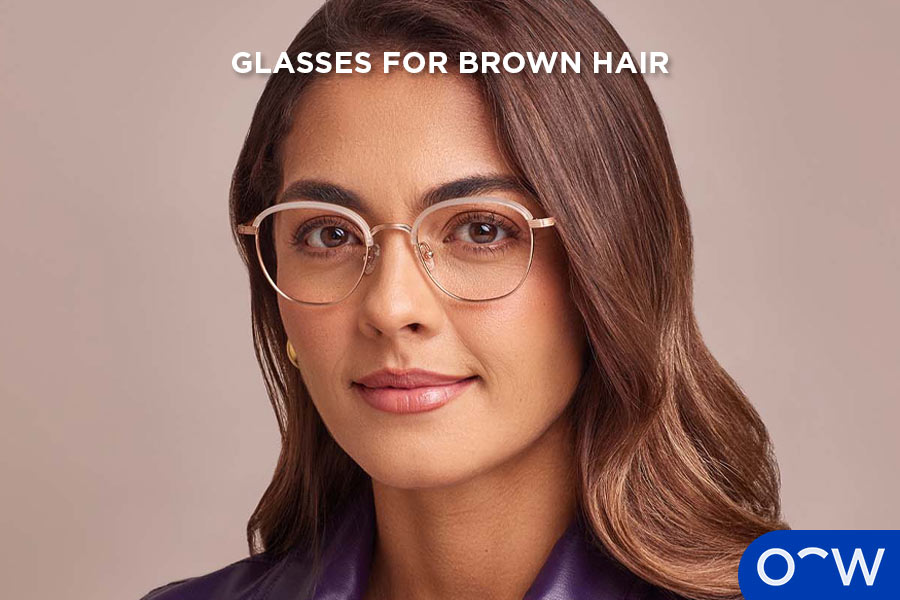 A woman with brown hair wearing optical glasses