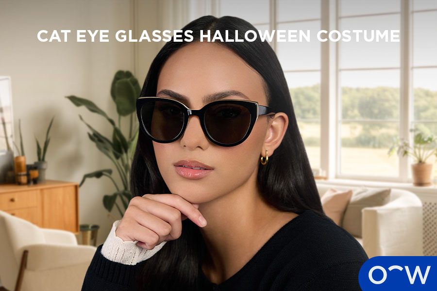 A woman wearing cat eye sunglasses.