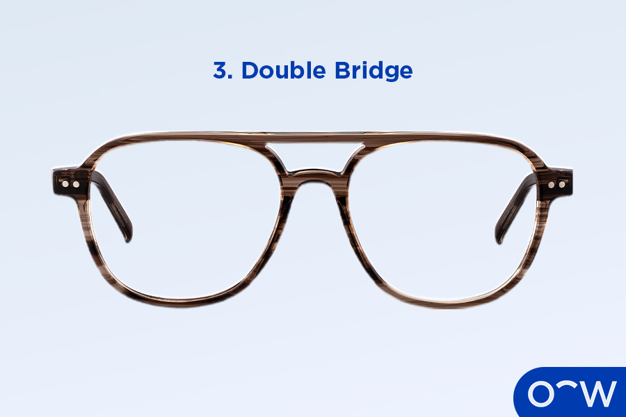 A pair of glasses with a double nose bridge.