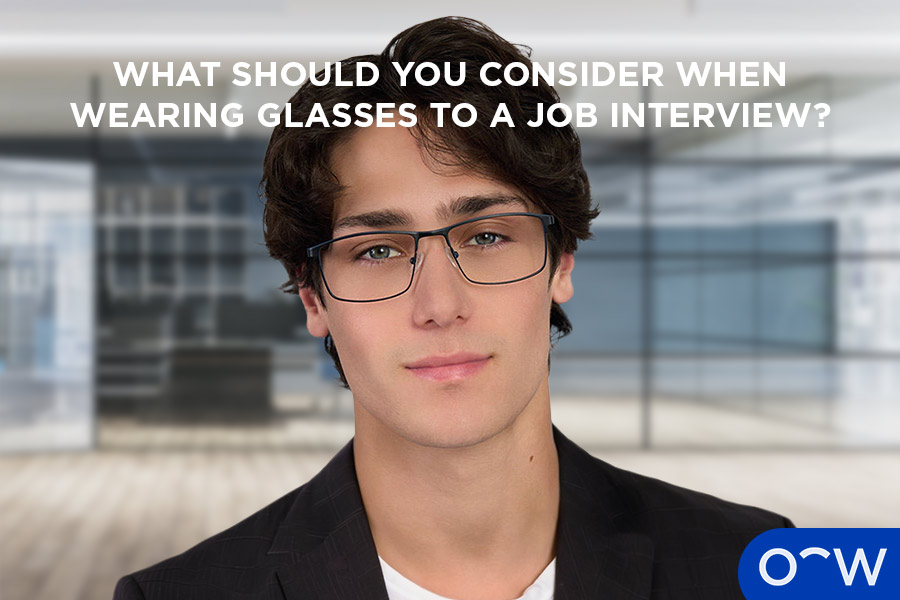 A man wearing Arnaud glasses in an interview environment.