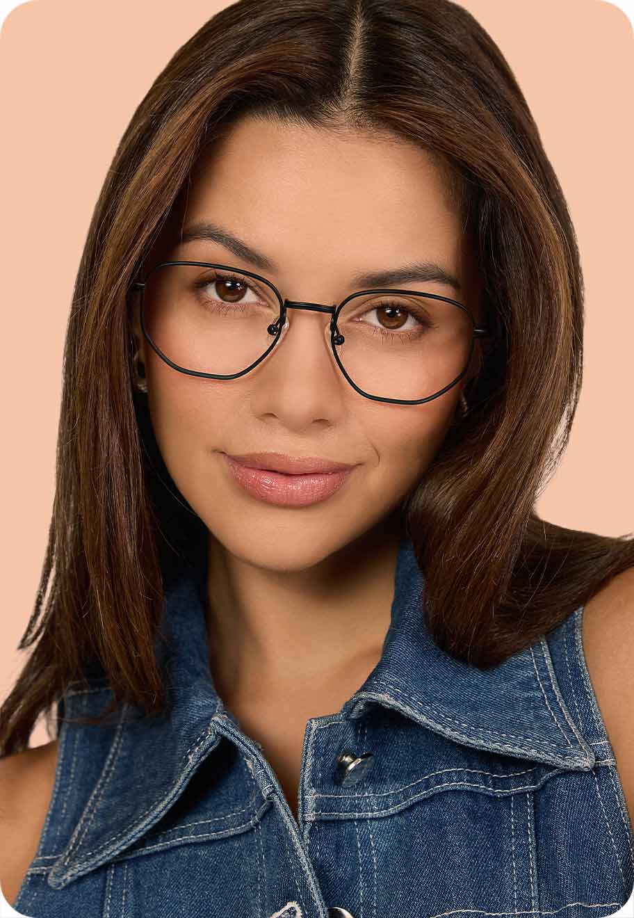 A photo of a model wearing the Oscar Wylee Farrell frame in acetate and stainless steel.
