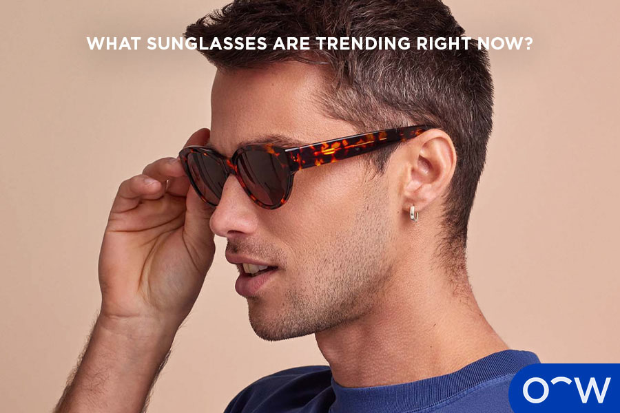 An image of a man wearing the Pia sunglasses in Butterscotch Tortoise.