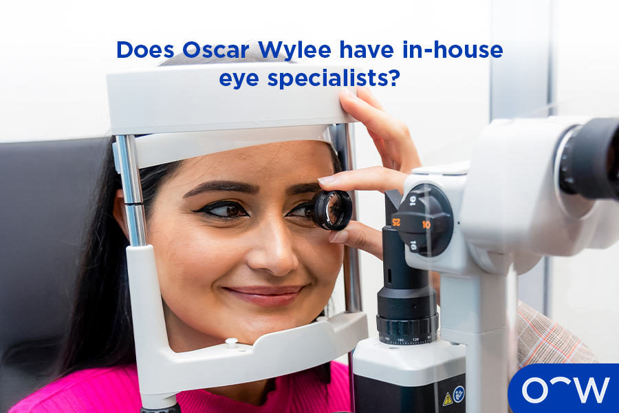 A photo of an eye test being conducted by an optometrist and patient.